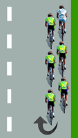 Le cycliste blanc est en tête du peloton